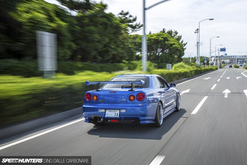 Blue Sports Car on Road — Dynamic, Afternoon, Photograph, Trees