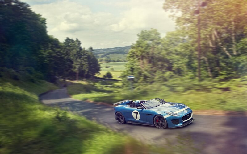 Blue Sports Car on Road — Dynamic, Afternoon