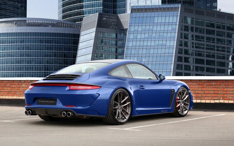 Blue sports car on rooftop