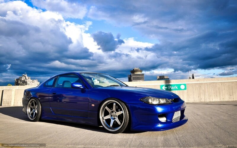 Blue sports car on rooftop