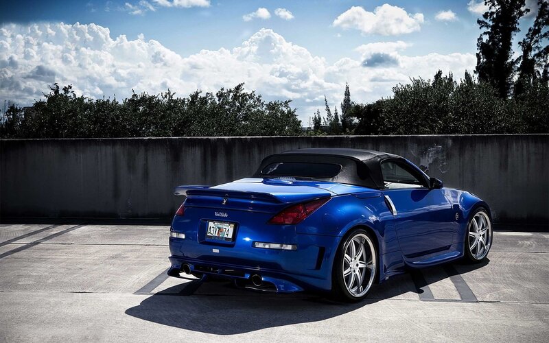 blue sports car on rooftop