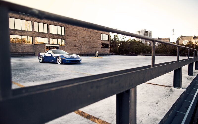 Blue sports car on rooftop