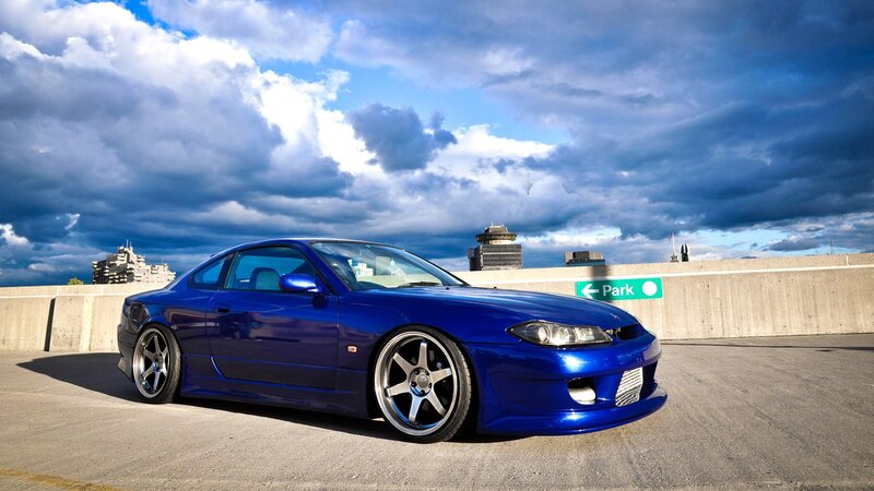 Blue sports car on rooftop
