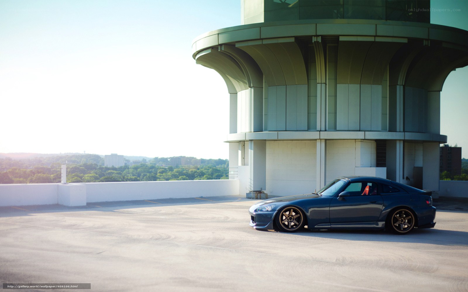 Blue sports car on rooftop