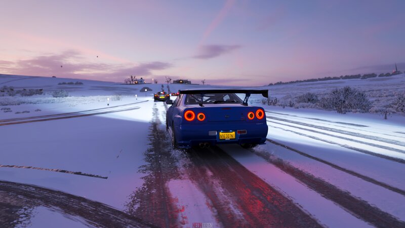 Blue Sports Car on Snow