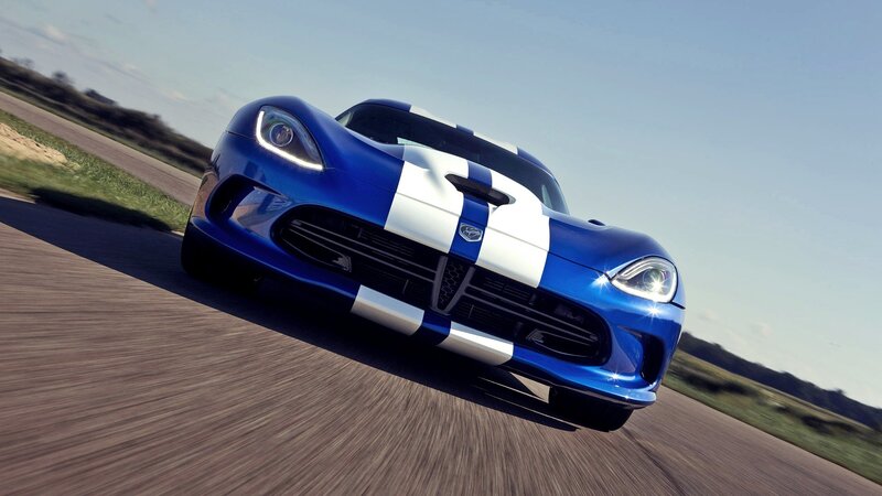 blue sports car on track
