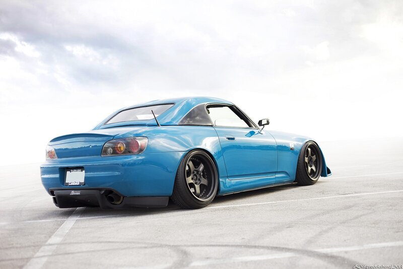 blue sports car on track
