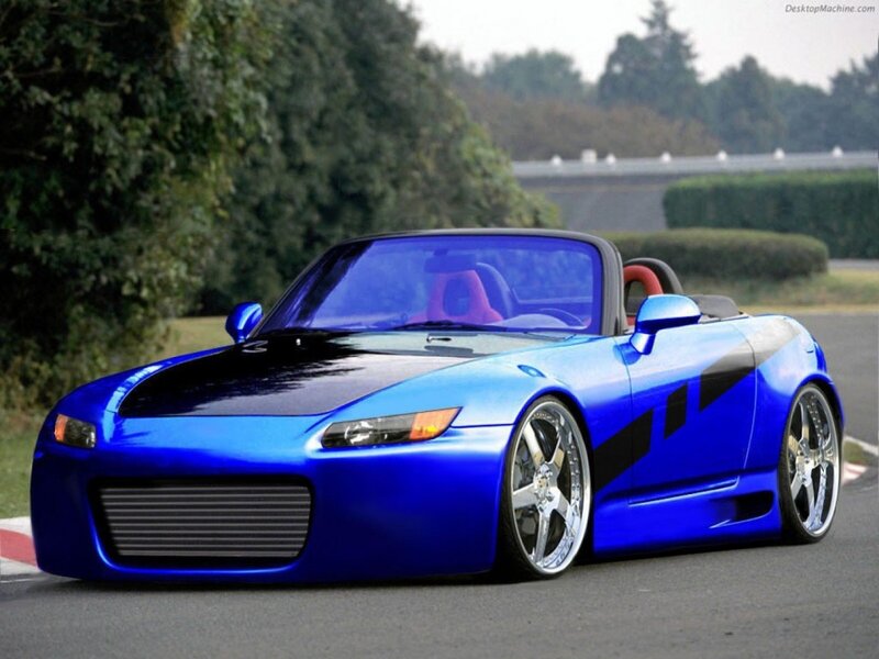 blue sports car on track