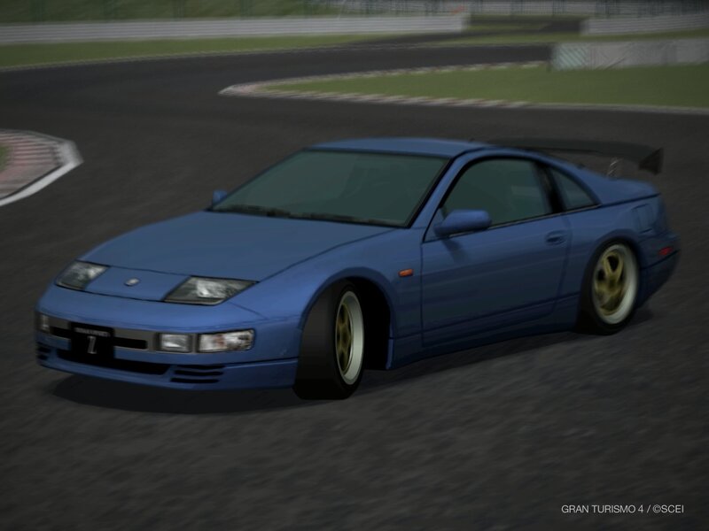 blue sports car on track
