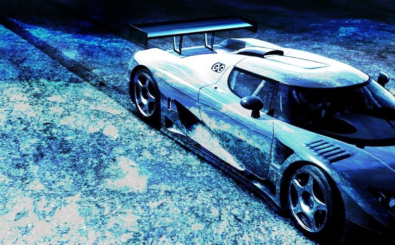 blue sports car on track