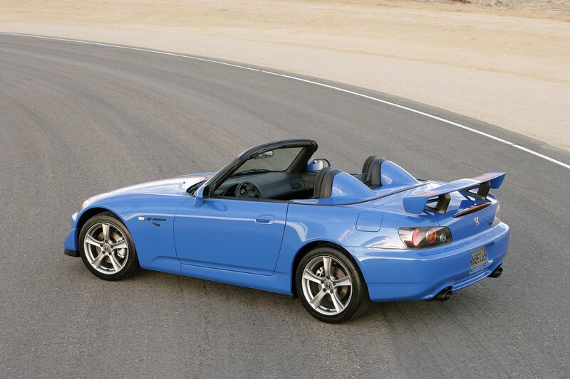 blue sports car on track