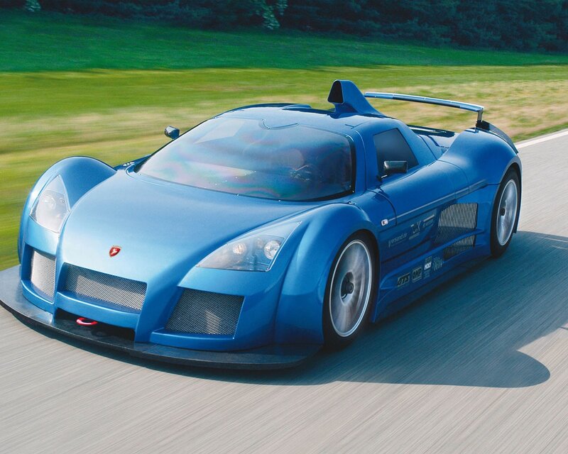 blue sports car on track