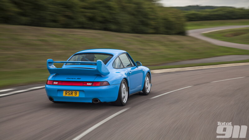 Blue Sports Car on Track — Dynamic, Afternoon, Photograph, Road