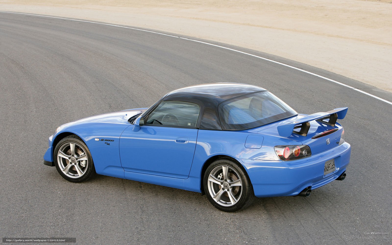 blue sports car on track