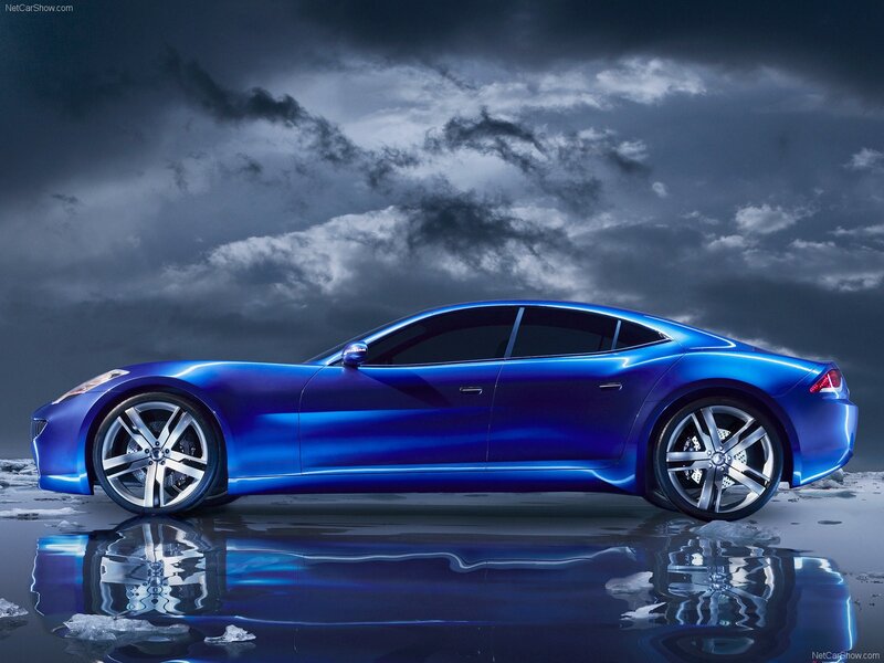 blue sports car on wet surface