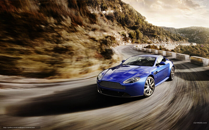 Blue sports car on winding road