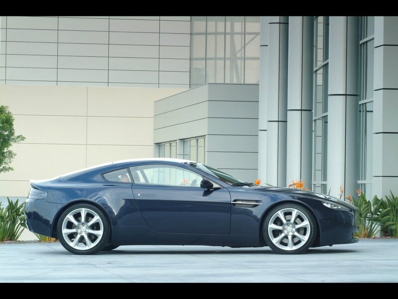 blue sports car parked outside