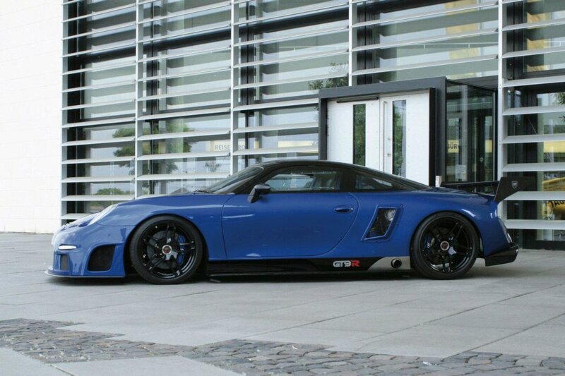 blue sports car parked outside