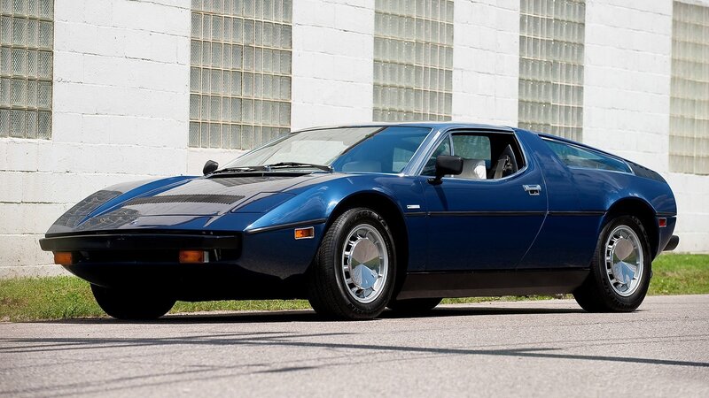 blue sports car parked outside