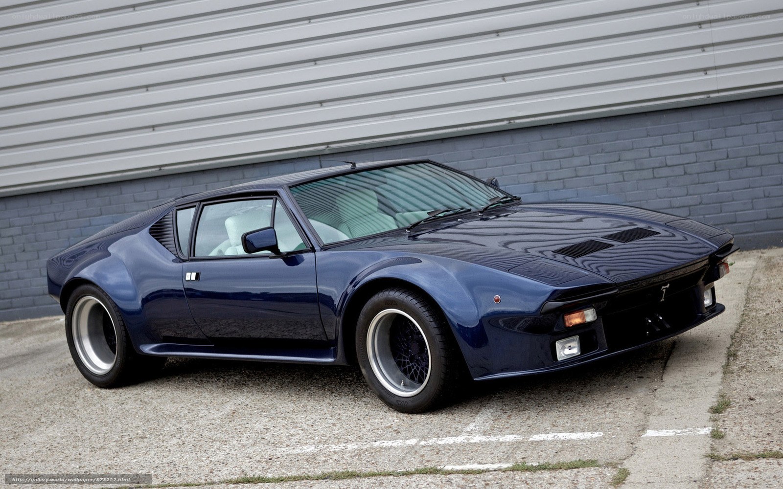 blue sports car parked