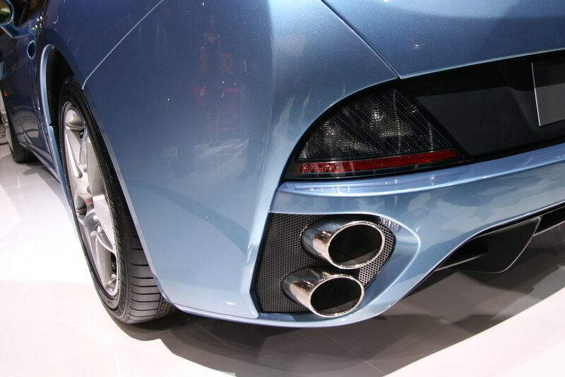 blue sports car rear view