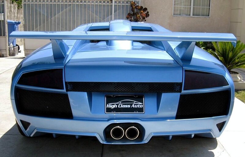blue sports car rear view