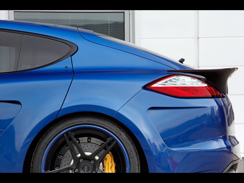 blue sports car rear view