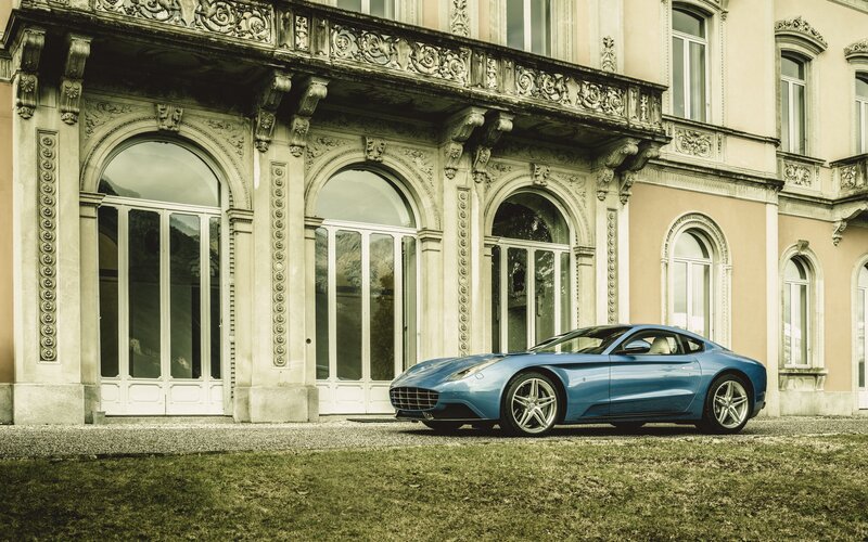 Blue Sports Car — Serene, Afternoon, Photograph, Building, Grass