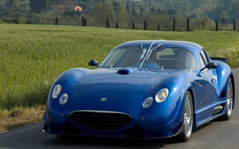 Blue Sports Car — Serene, Afternoon, Photograph, Field, Road