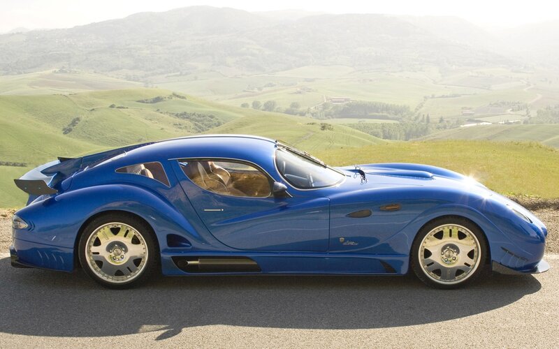 Blue Sports Car — Serene, Afternoon, Photograph, Hills