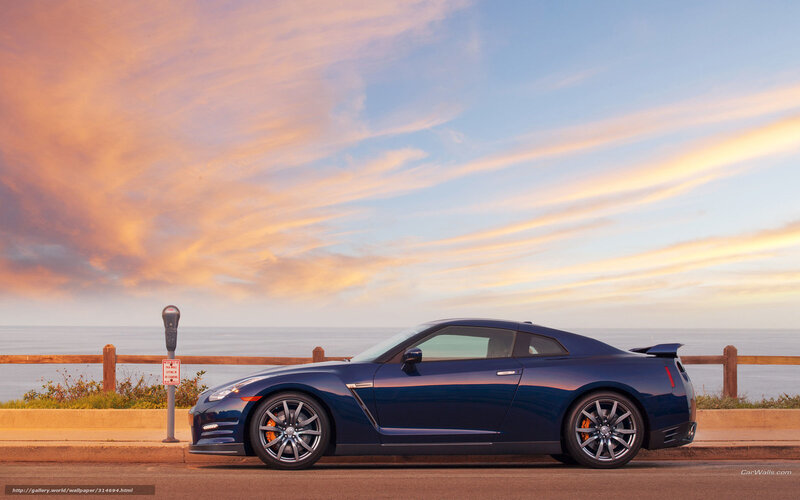 Blue Sports Car — Serene, Sunset, Photograph, Ocean