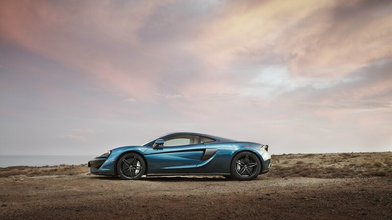 Blue Sports Car — Serene, Sunset, Photograph, Sky
