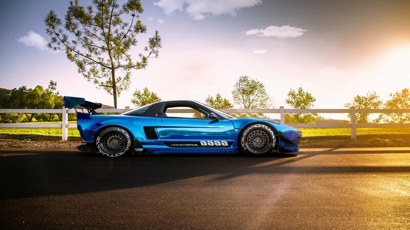 Blue Sports Car — Serene, Sunset, Photograph, Tree, Fence
