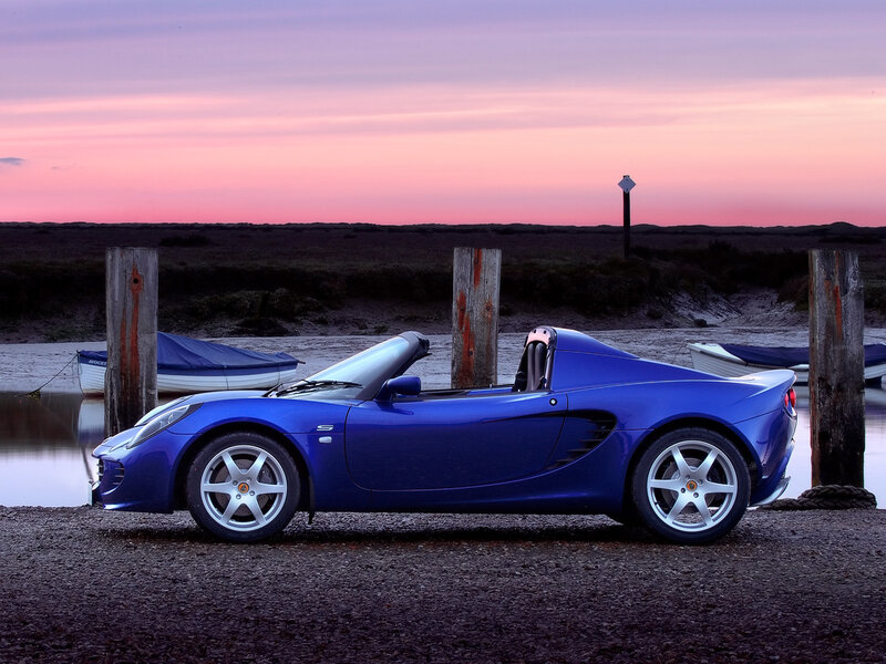 Blue Sports Car — Serene, Sunset