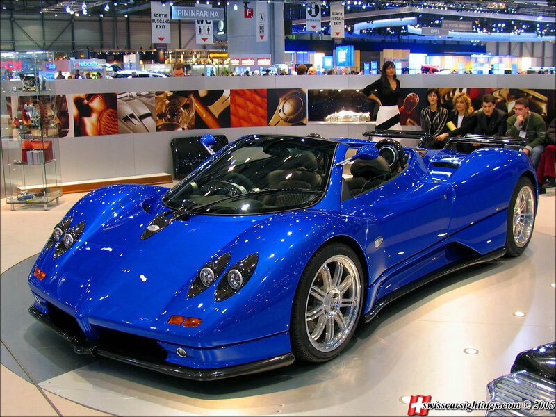 Blue Sports Car — Showroom, Photograph, People