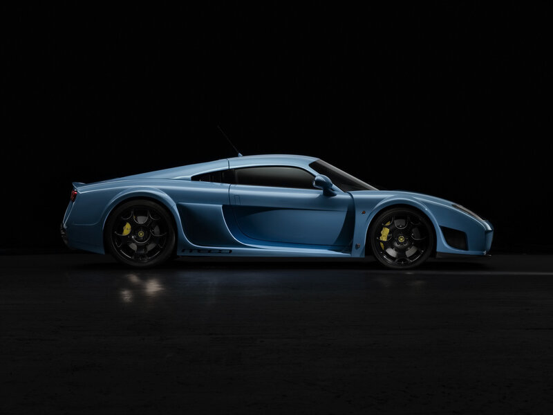blue sports car side profile