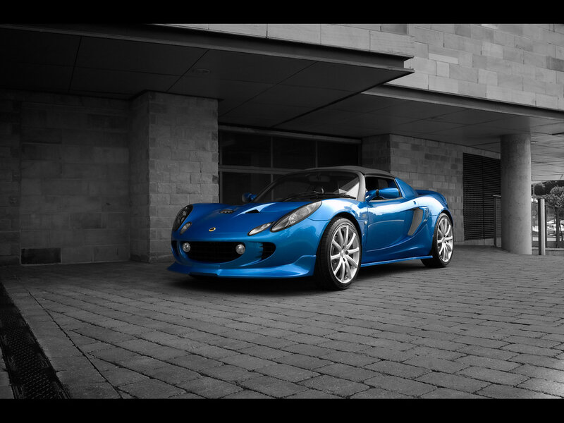 Blue sports car under a canopy