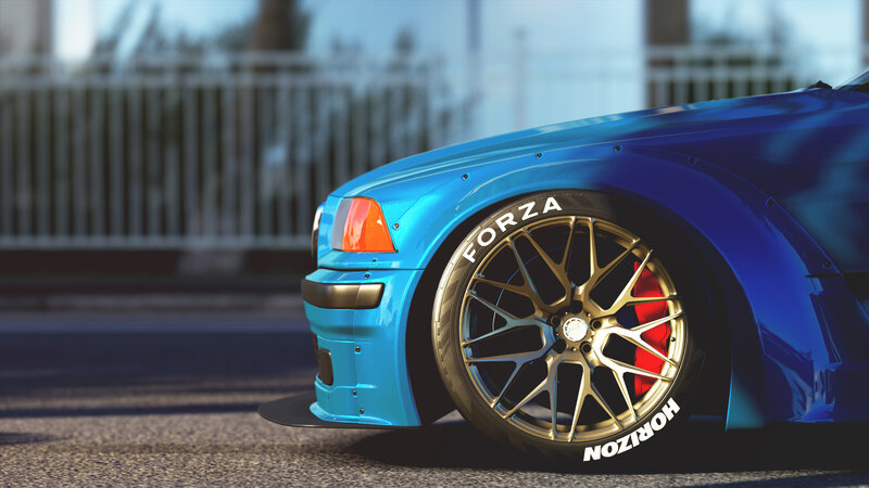 Blue Sports Car Wheel — Dramatic, Afternoon