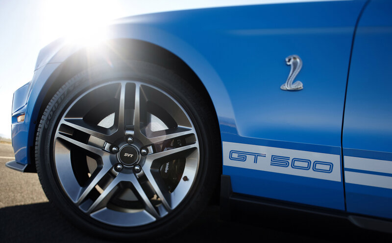 Blue Sports Car Wheel — Dramatic
