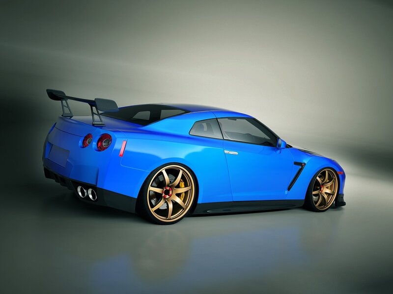 Blue sports car with gold wheels