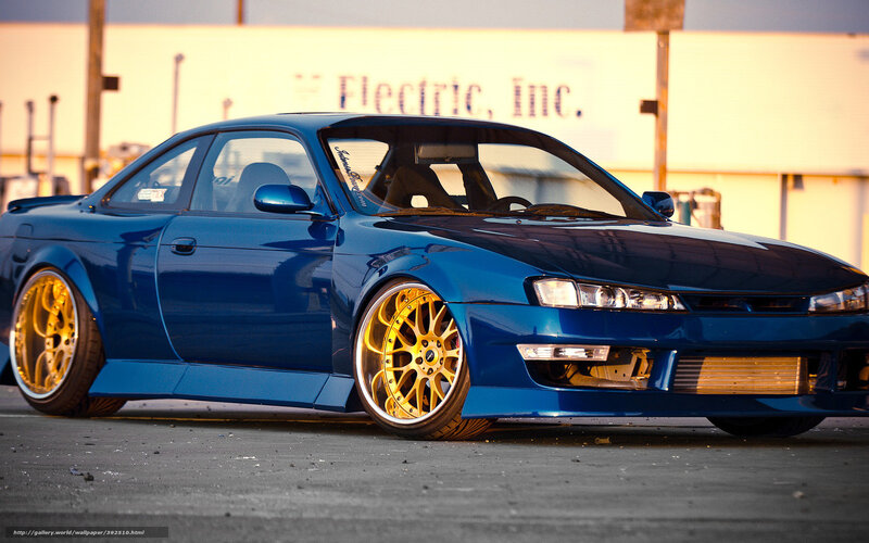 blue sports car with gold wheels