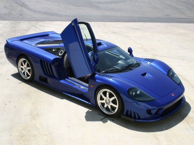 blue sports car with open door