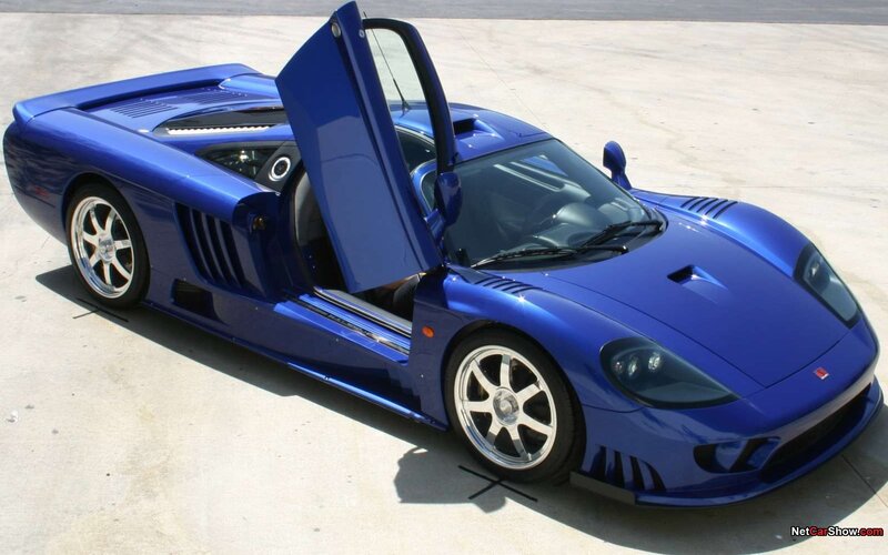 blue sports car with open door