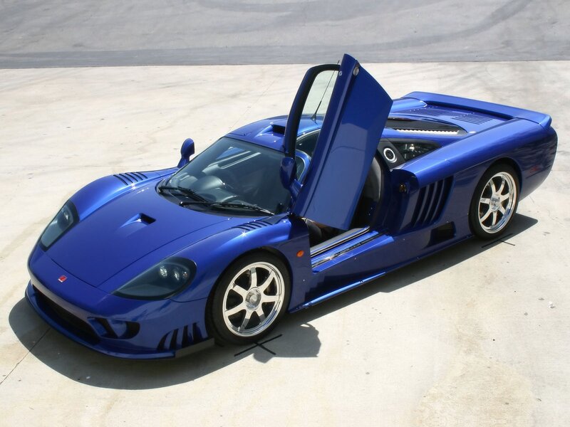 blue sports car with open door
