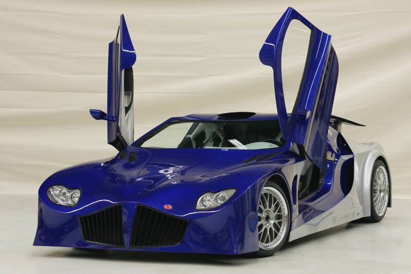 Blue sports car with open doors
