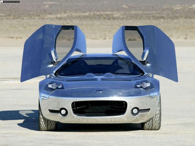 blue sports car with open doors