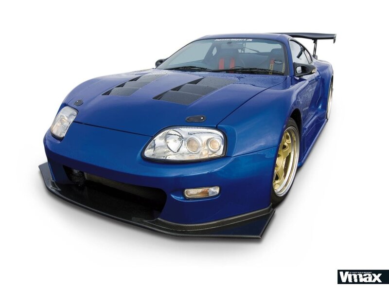 blue sports car with racing modifications