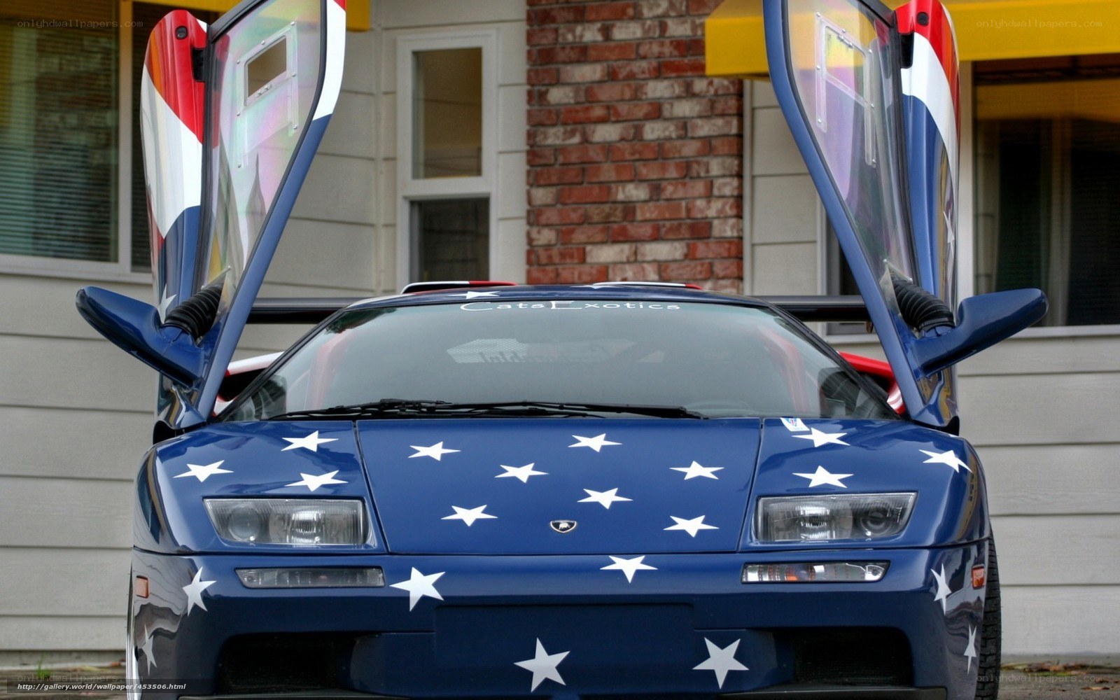 blue sports car with stars