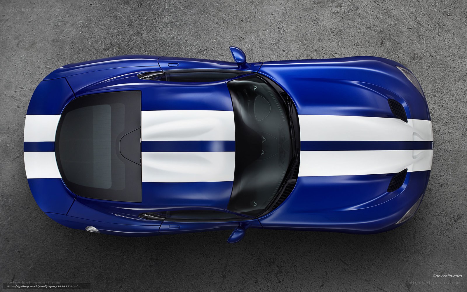blue sports car with white stripes