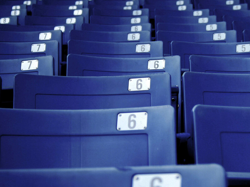 Blue stadium seats in rows